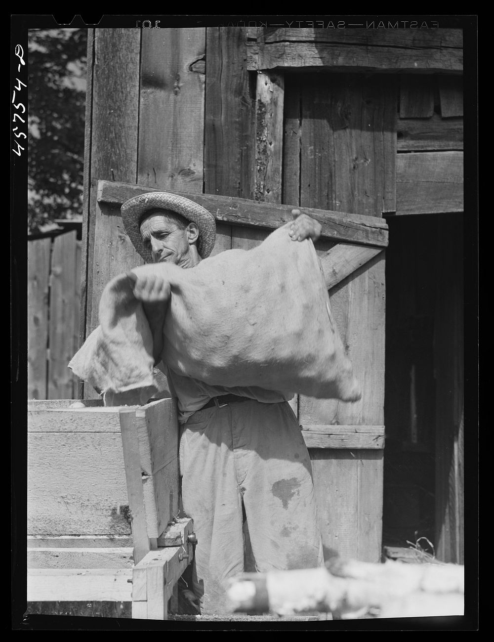 [Untitled photo, possibly related to: A Vermonter who was working at the old cider exhibit at the Tunbridge Fair. Tunbridge…