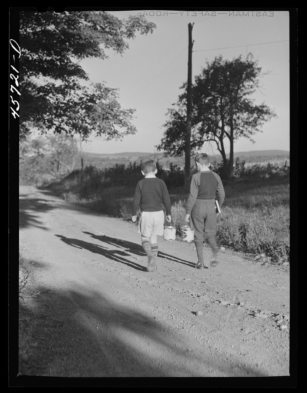 [Untitled photo, possibly related to: Two of the Gaynor children going to school near Fairfield, Vermont]. Sourced from the…