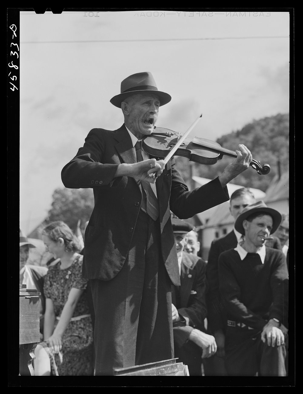[Untitled photo, possibly related to: Fiddler, Mr. Ed. Lorkin [i.e. Larkin] for the square dances at the World's Fair at…