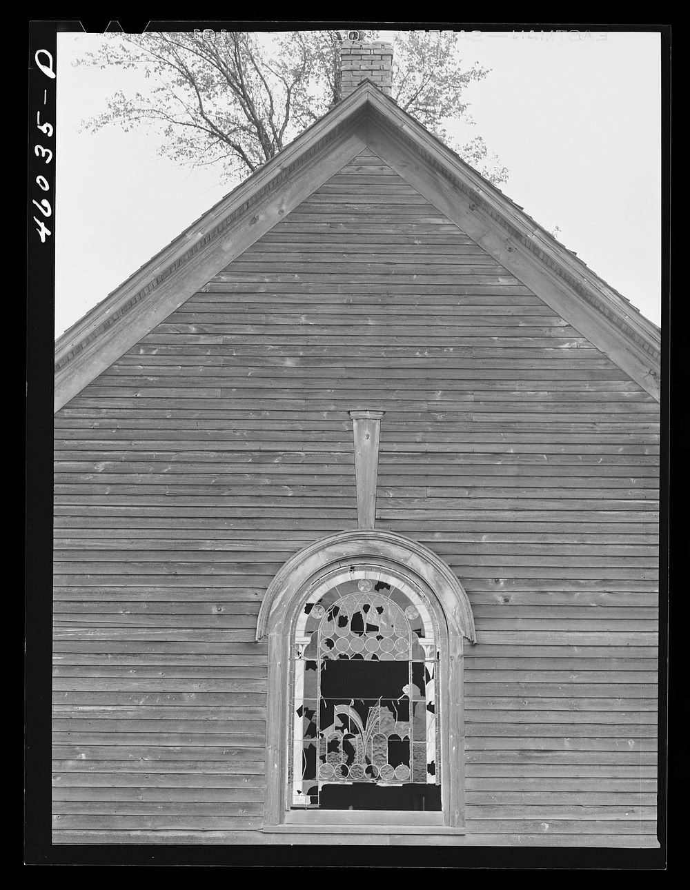 Abandoned church in what used to be Lewisburg, New York in the Pine Camp expansion area. Sourced from the Library of…
