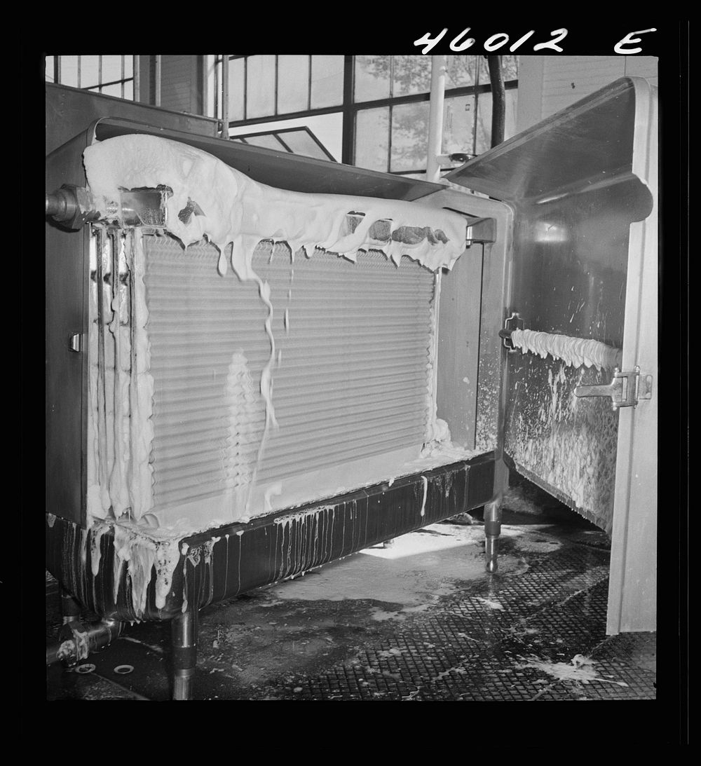 Cooling unit for skim milk at the United Farmers' Cooperative Creamery in Sheldon Springs, Vermont. Sourced from the Library…