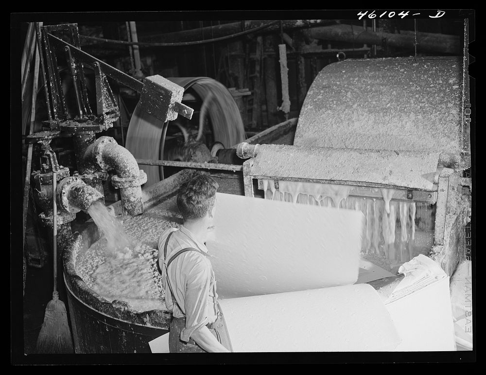 Putting paper pulp into vats which further churn the pulp at the Mississquoi Corporation paper mill in Seldon Springs…