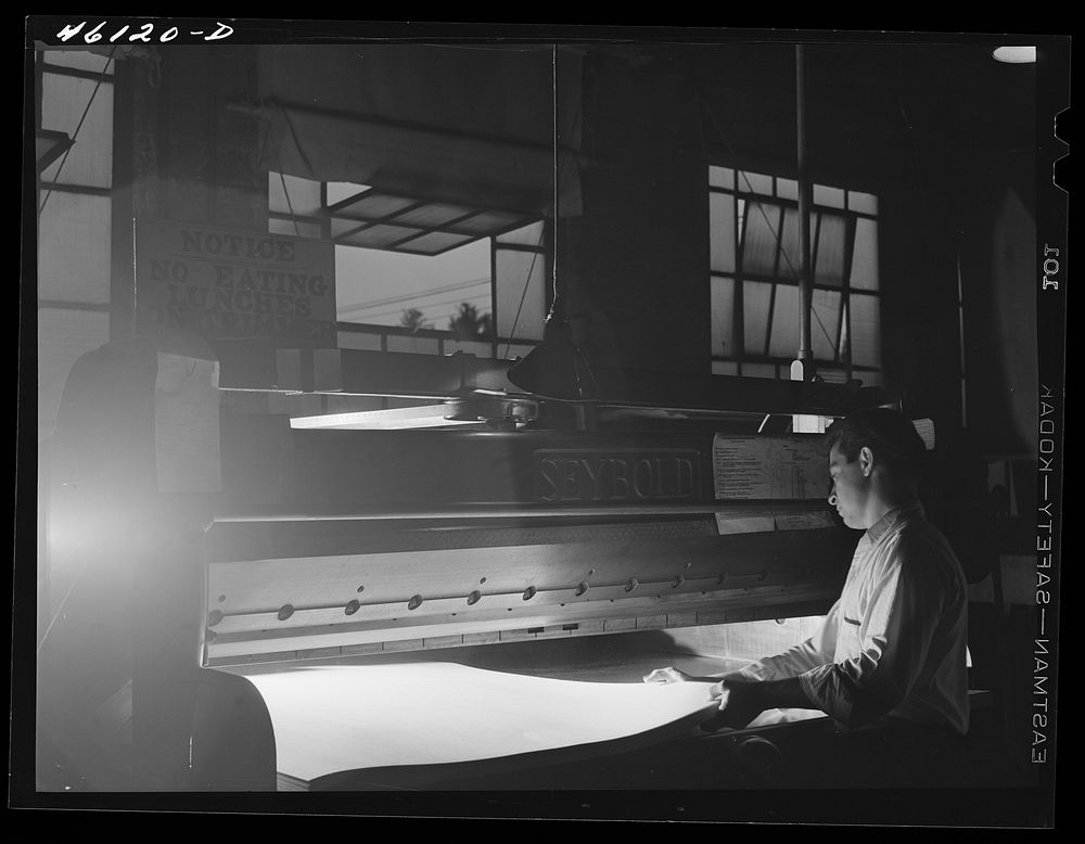 [Untitled photo, possibly related to: Trimming paper at the Mississquoi Corporation paper mill in Sheldon Springs, Vermont].…