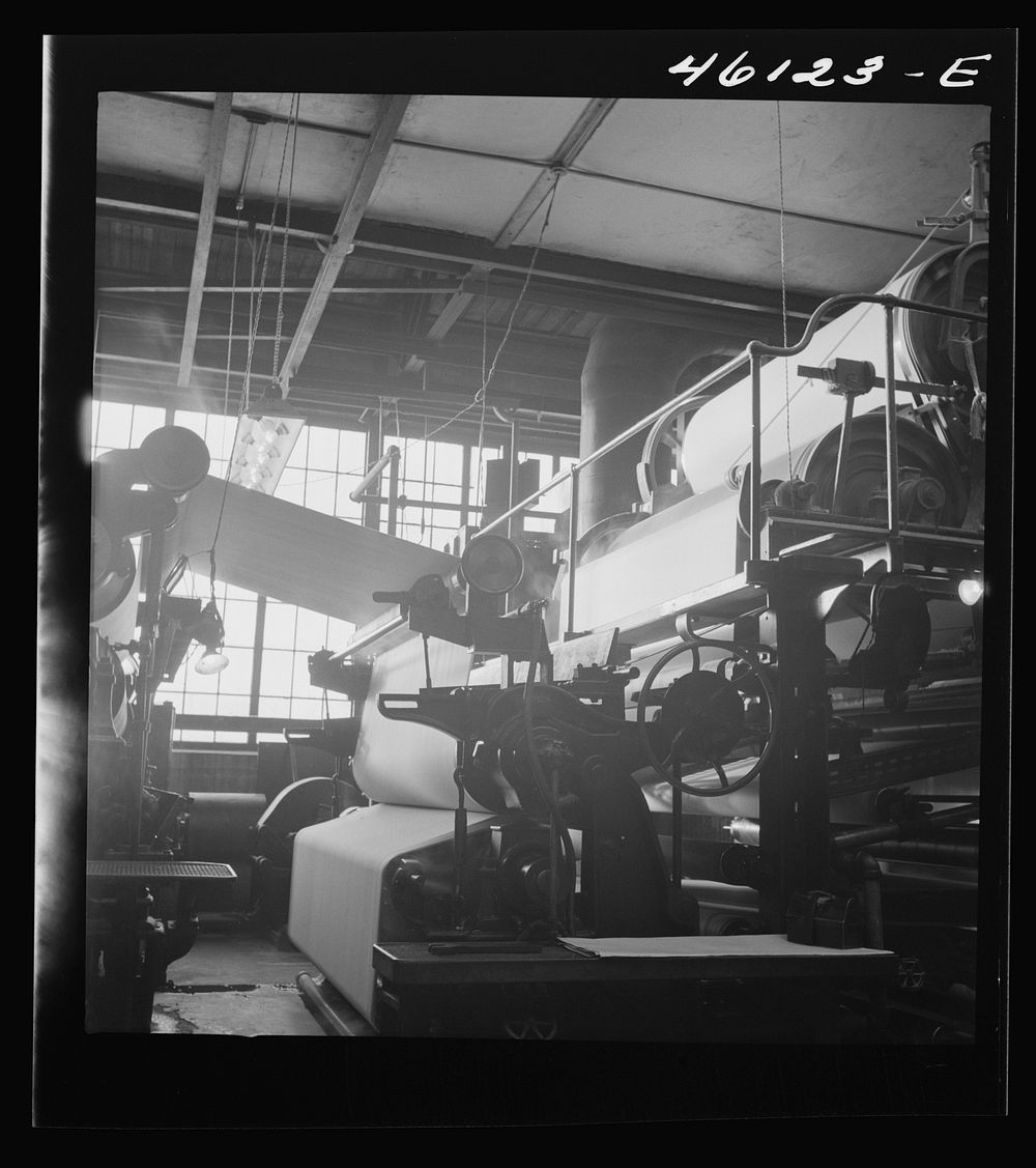 [Untitled photo, possibly related to: One of the rolling machines in the Mississquoi Corporation paper mill. Sheldon…