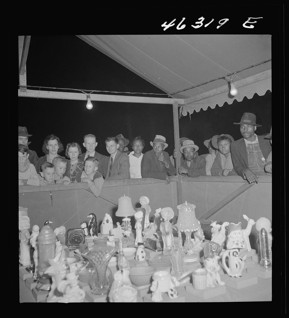 [Untitled photo, possibly related to: Greensboro, Georgia. The Greene County fair in the evening]. Sourced from the Library…