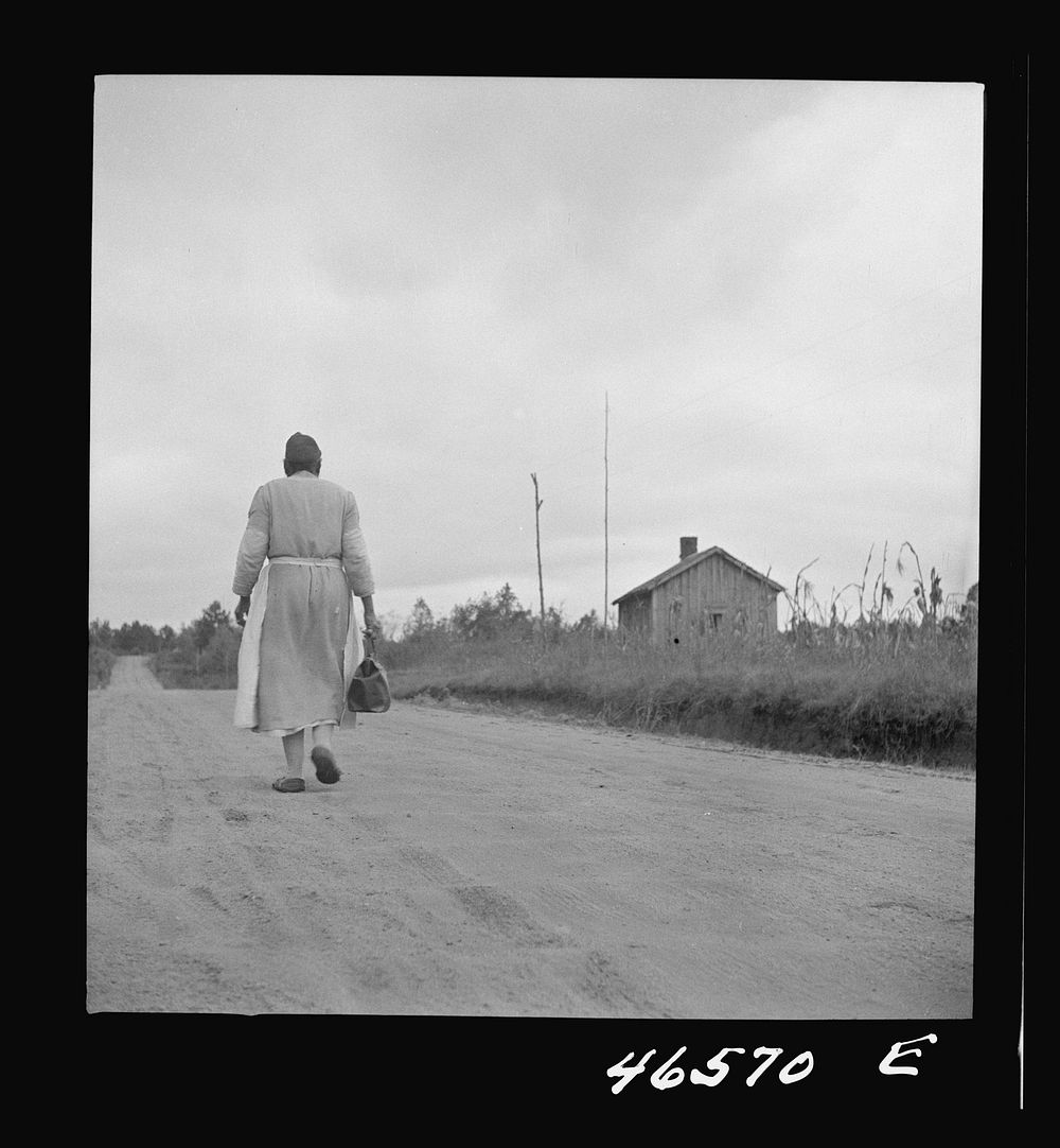 [Untitled photo, possibly related to: Midwife going on a call, carrying her kit, near Siloam, Greene County, Georgia].…