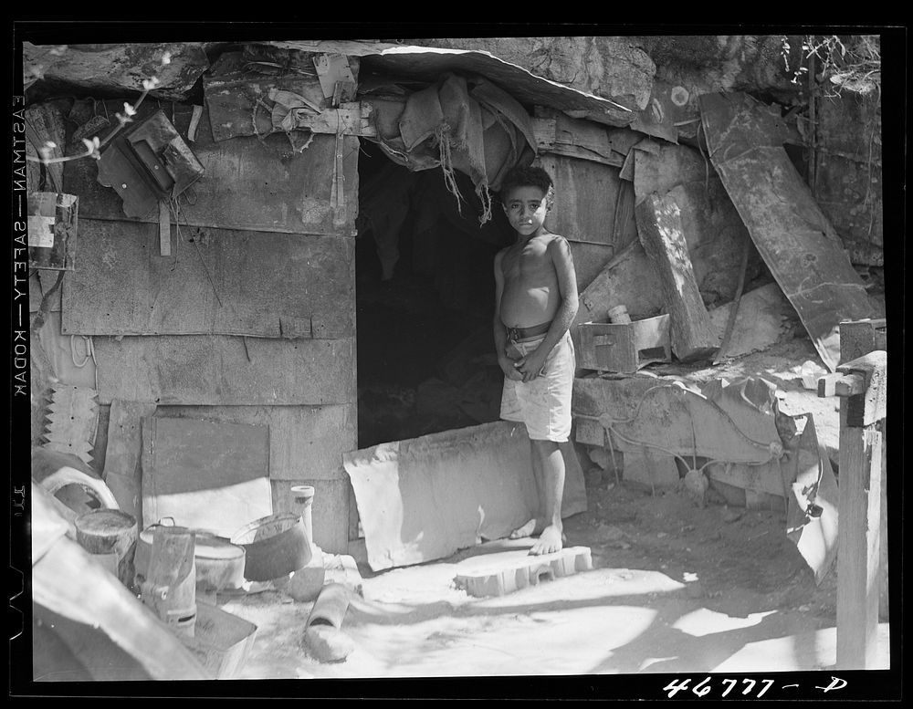 [Untitled photo, possibly related to: Ponce, Puerto Rico. A cave in slum area in which two people live]. Sourced from the…