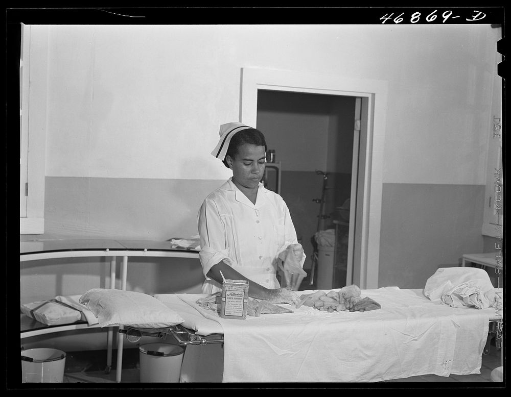 Christiansted, Saint Croix Island, Virgin Islands. One of the nurses in the operating room at the Christiansted hospital.…