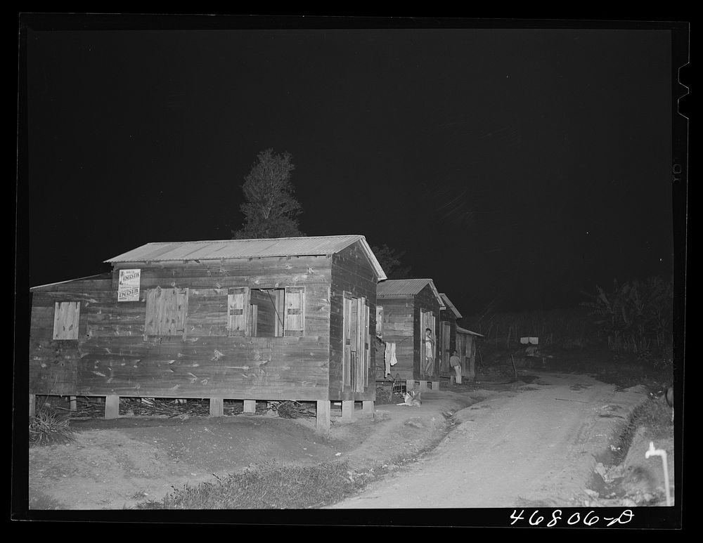Corozal, Puerto Rico. Houses in slum area at night. Sourced from the Library of Congress.