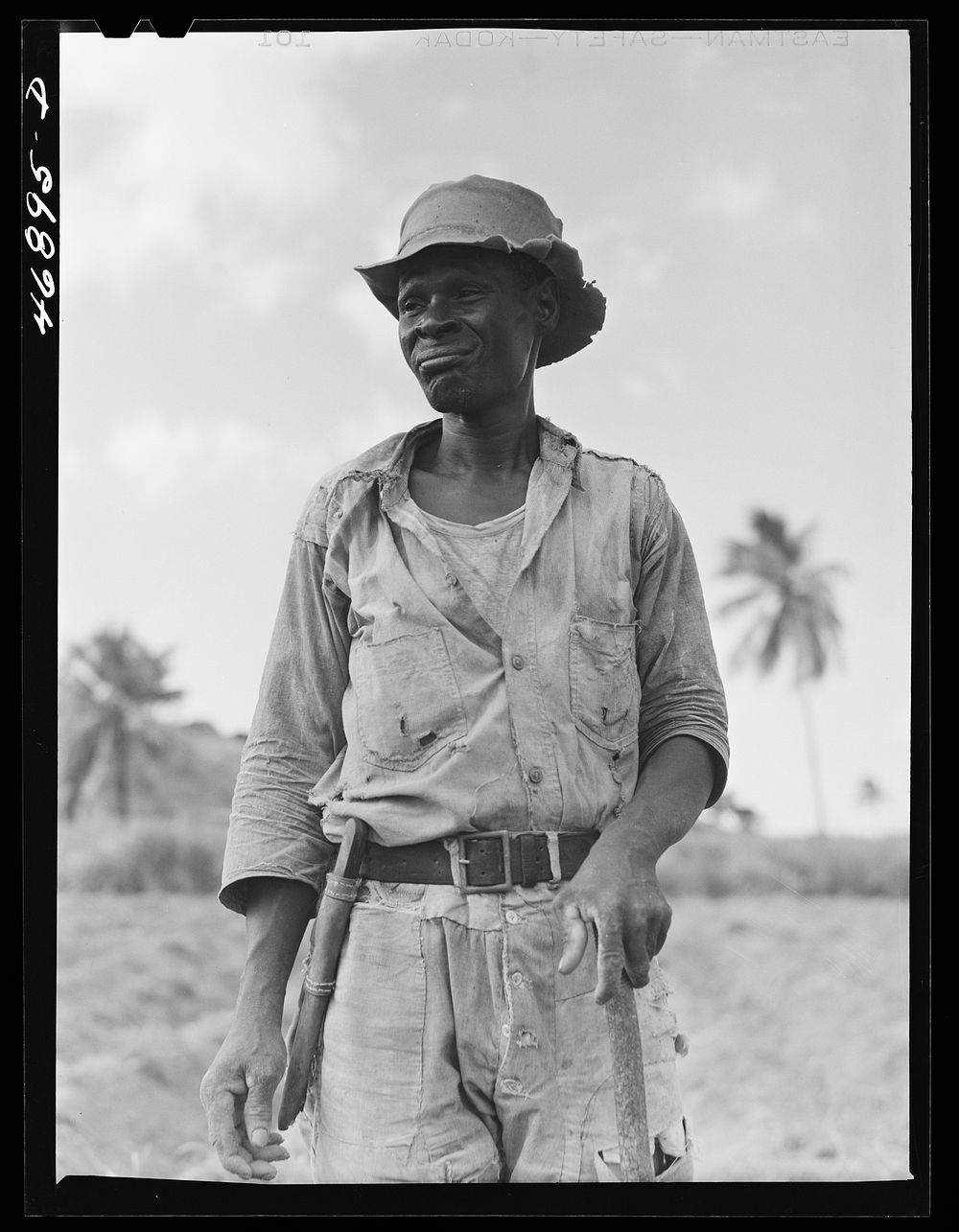 [Untitled photo, possibly related to: Christiansted (vicinity), Saint Croix Island, Virgin Islands. Outfit worn by a farmer…