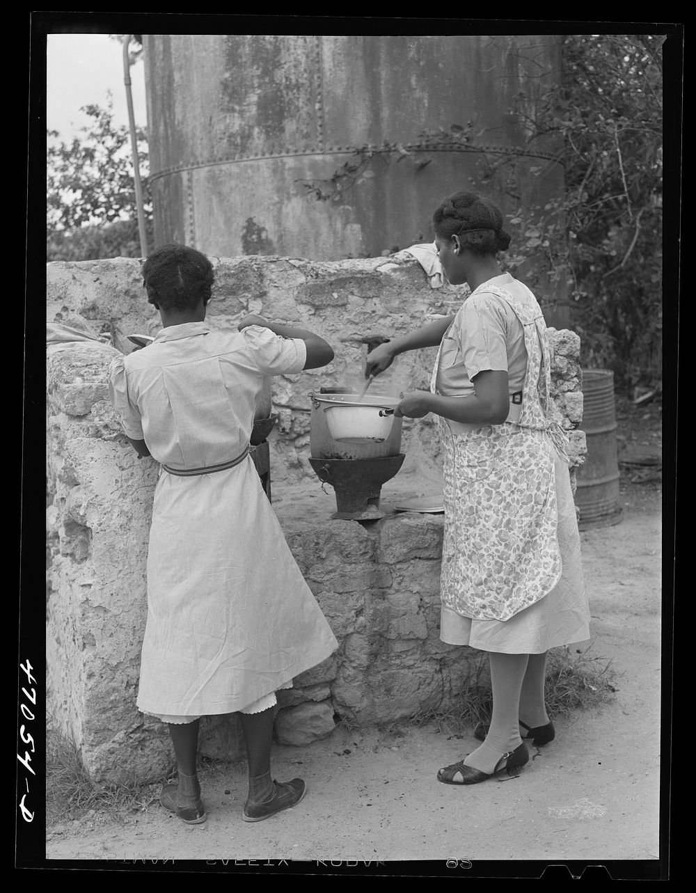 Christiansted, Saint Croix Island, Virgin Islands (vicinity). Cooking hot lunches for children at Peter's Rest elementary…