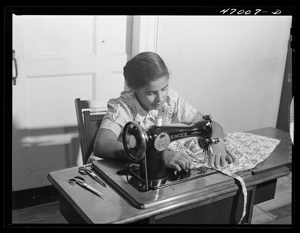 Christiansted, Saint Croix Island, Virgin Islands. Girls' sewing class in the Christiansted high school. Sourced from the…