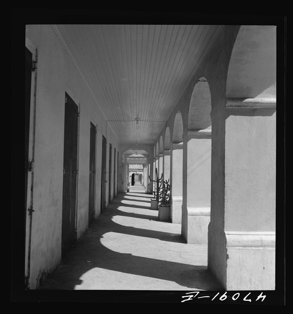 [Untitled photo, possibly related to: Christiansted, Saint Croix Island, Virgin Islands. Sidewalk on a main street]. Sourced…