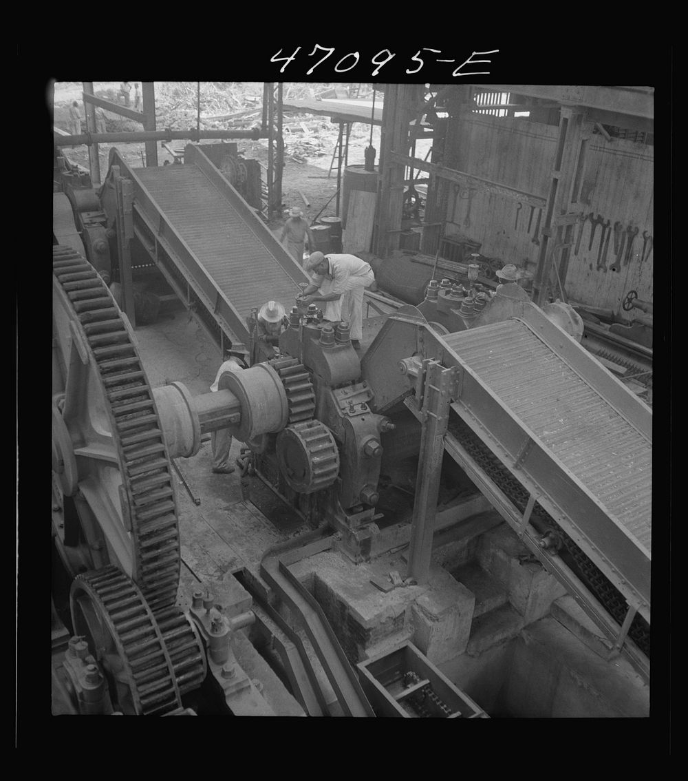Saint Croix Island, Virgin Islands. Reconditioning machinery in the Bethlehem sugar mill. Sourced from the Library of…