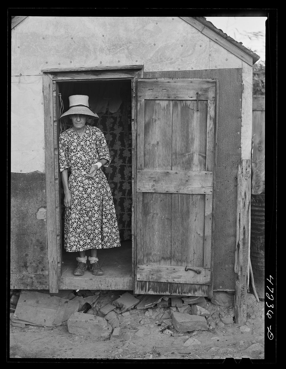 French village, a small settlement on Saint Thomas Island, Virgin Islands. French woman living in one of the tiny hillside…