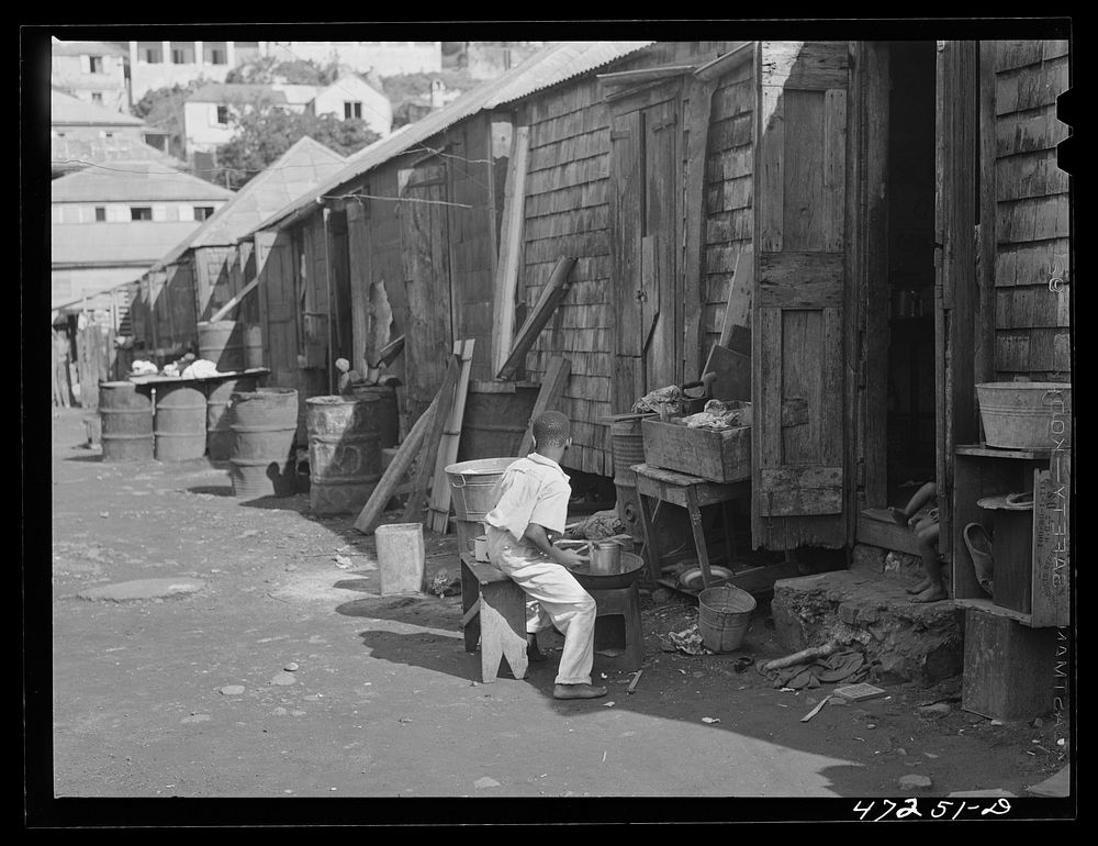 [Untitled photo, possibly related to: Charlotte Amalie, Saint Thomas Island, Virgin Islands. Painting furniture and cleaning…