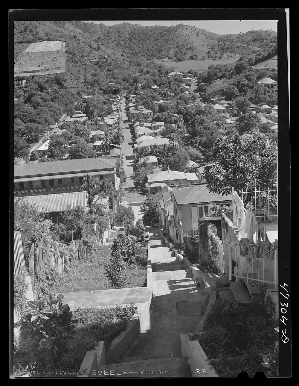 [Untitled photo, possibly related to: Charlotte Amalie, Saint Thomas Island, Virgin Islands. One of the steep hillside…