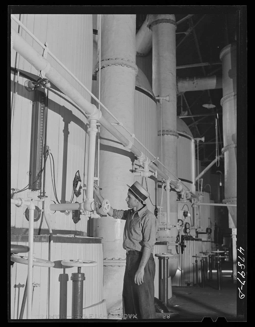 [Untitled photo, possibly related to: Ensenada, Puerto Rico. Vats for boiling and crystalizing the syrup in the South Puerto…