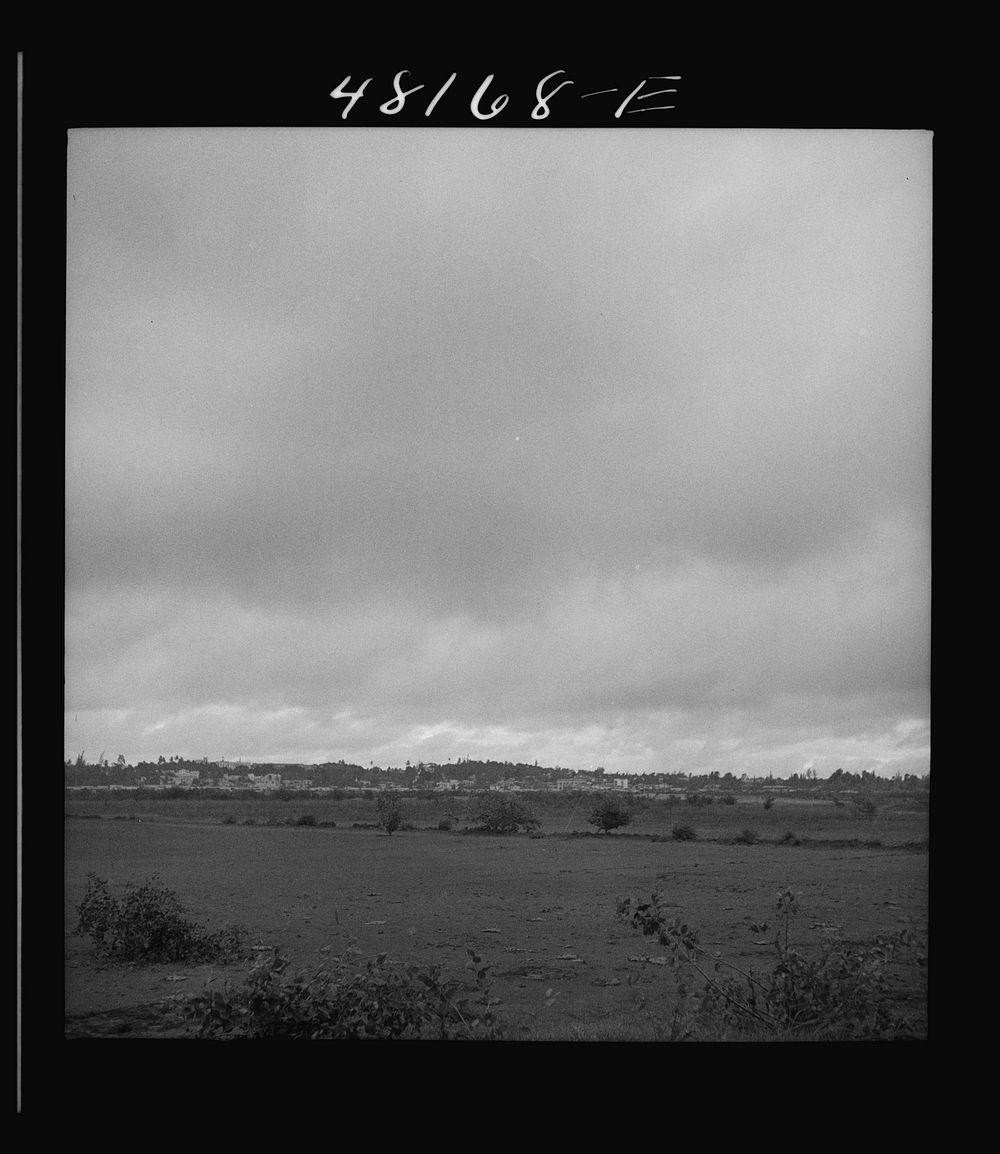 Santurce, Puerto Rico (vicinity). View of some of the land which FSA (Farm Security Administration) is buying for a land and…