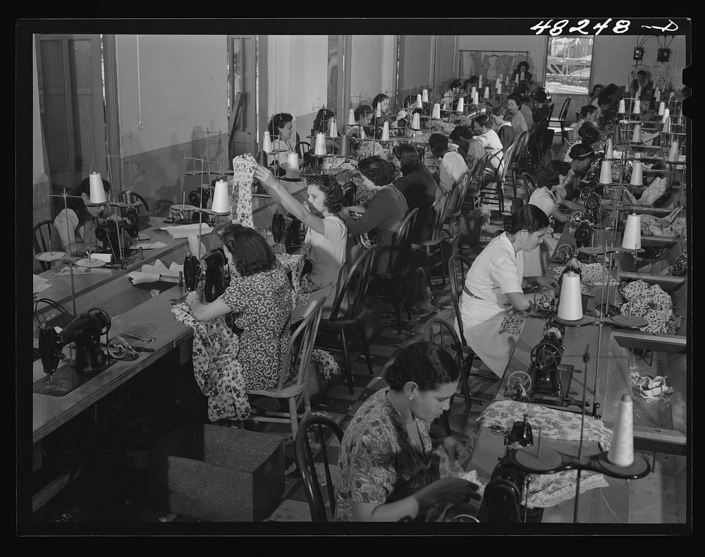 In a needlework factory. Vicinity of San Juan, Puerto Rico. Sourced from the Library of Congress.