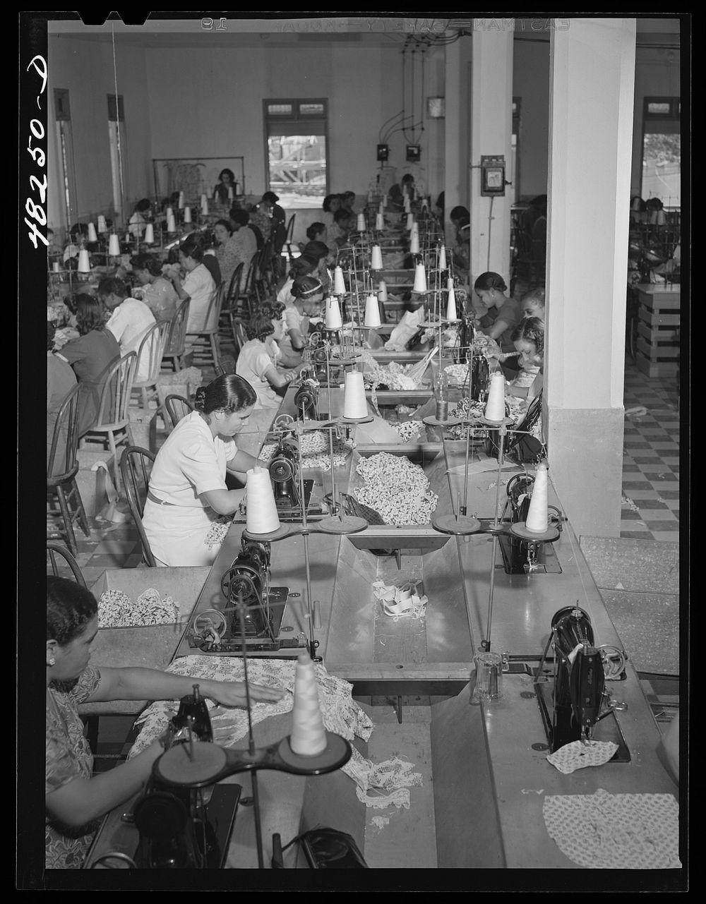 [Untitled photo, possibly related to: San Juan (vicinity), Puerto Rico. In a needlework factory]. Sourced from the Library…