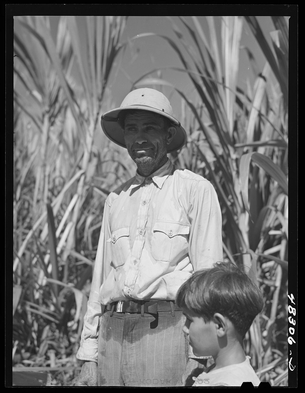 [Untitled photo, possibly related to: Rio Piedras (vicinity), Puerto Rico. Union organizer who was visiting a FSA (Farm…