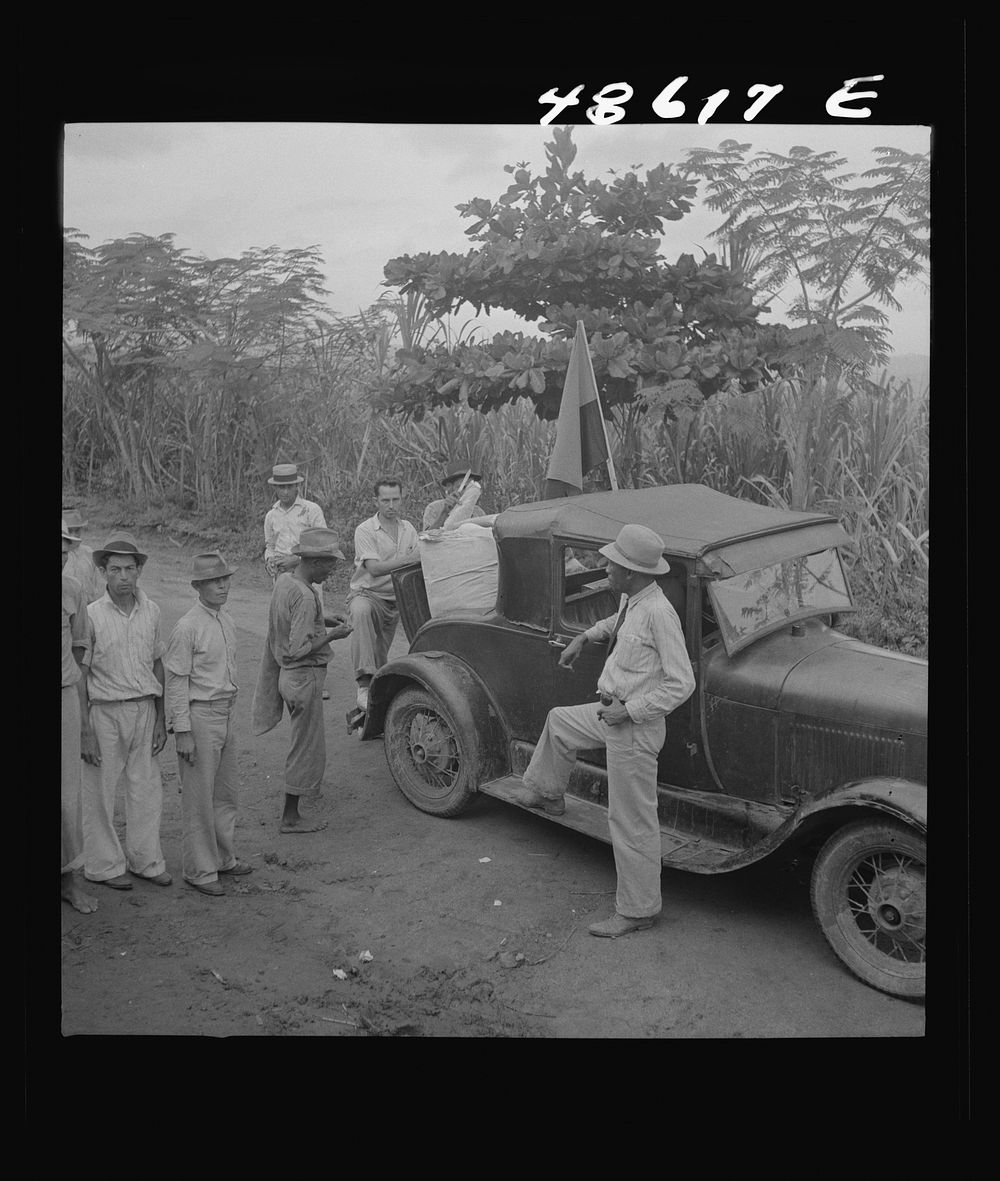 Yabucoa, Puerto Rico. Car bringing lunch to pickets against the management of a sugar plantation. Sourced from the Library…