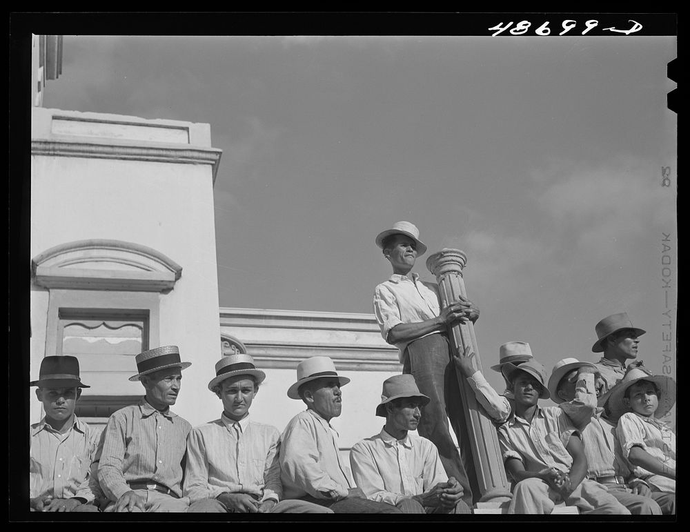 Yabucoa, Puerto Rico. Strikers at a mass meeting in the plaza. Sourced from the Library of Congress.