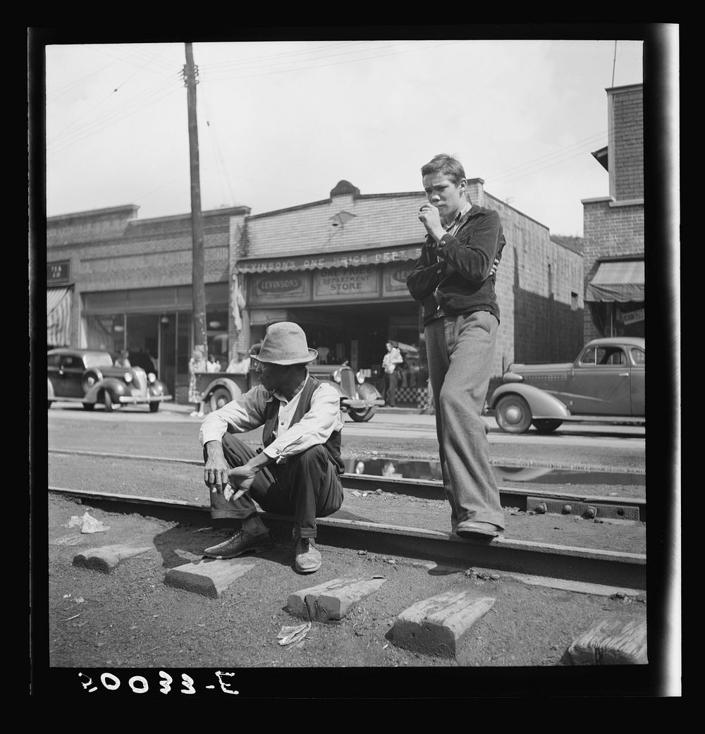 "Sittin' around" mining town. Osage, West Virginia. Sourced from the Library of Congress.