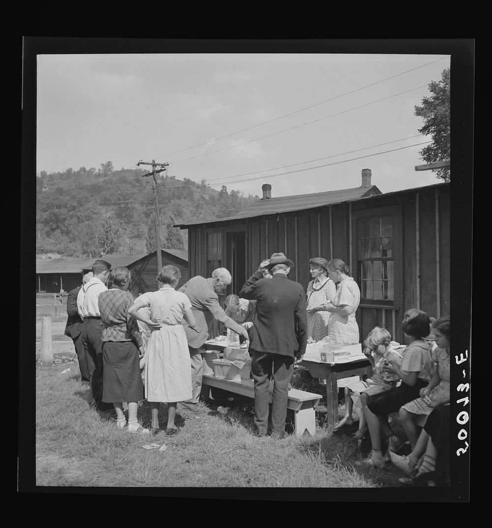 Sunday school picnic brought into abandoned mining town of Jere, West Virginia by neighboring parishoners. Sourced from the…