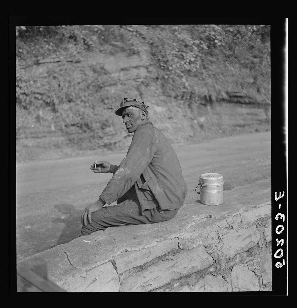 Coal miner waiting for lift home. Capels, West Virginia. Sourced from the Library of Congress.