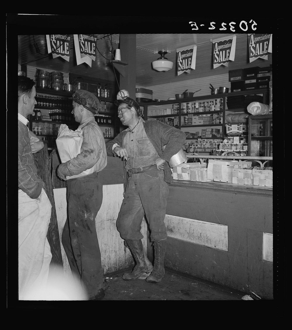 [Untitled photo, possibly related to: Coal miners buying supplies in company store. Scotts Run, West Virginia]. Sourced from…