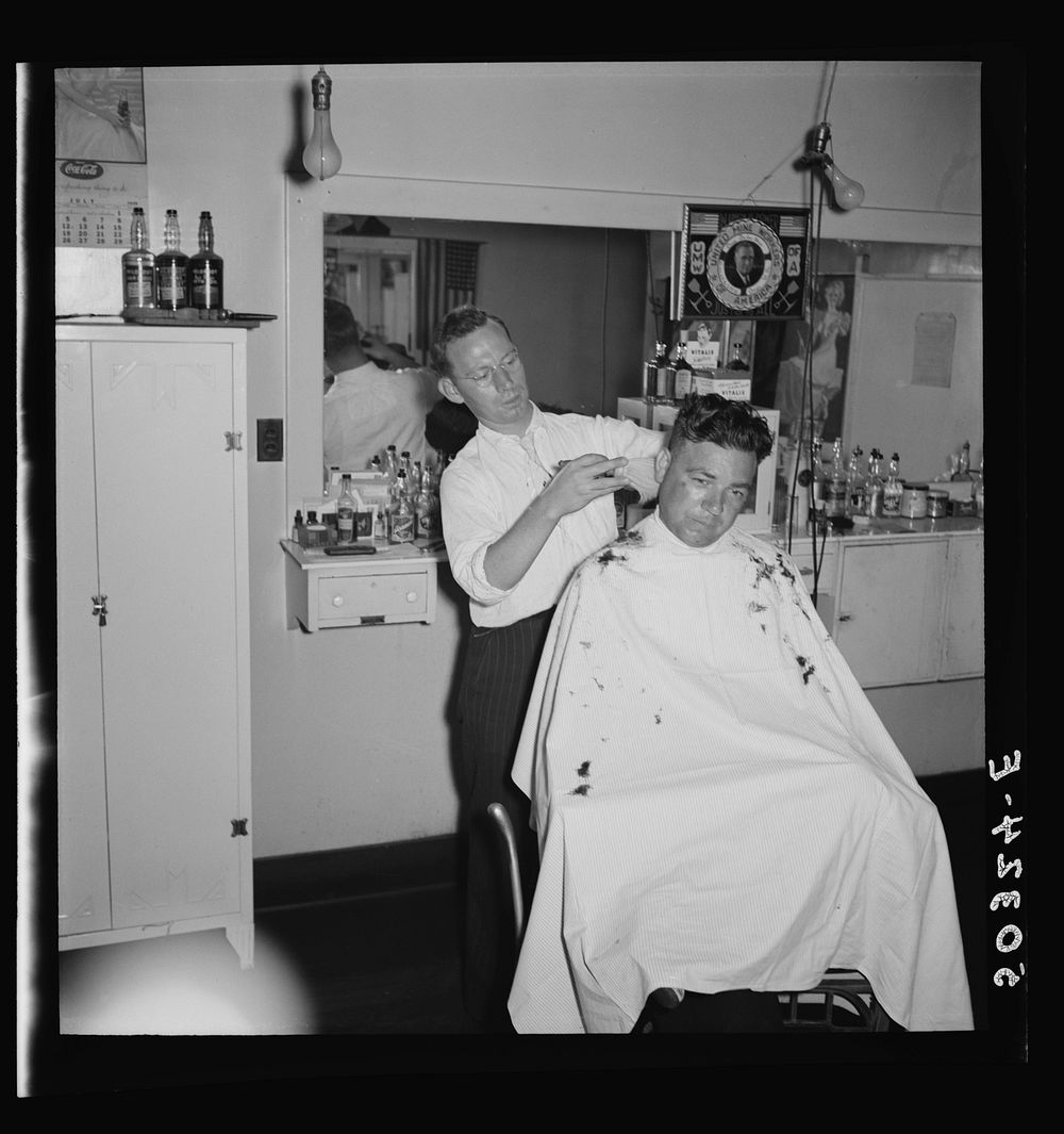 [Untitled photo, possibly related to: The barber is also the Justice of Peace in mining town of Osage, West Virginia].…