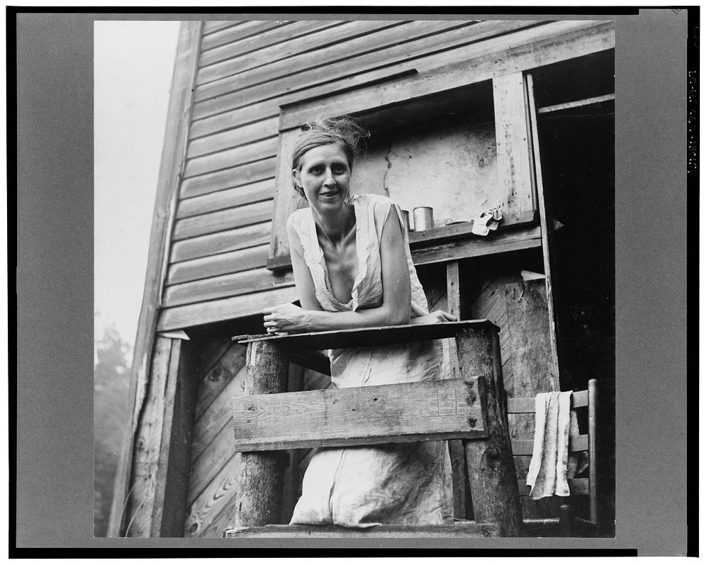 Wife of unemployed coal miner, suffering from T.B., living in old company store. Abandoned mining town of Marine, West…