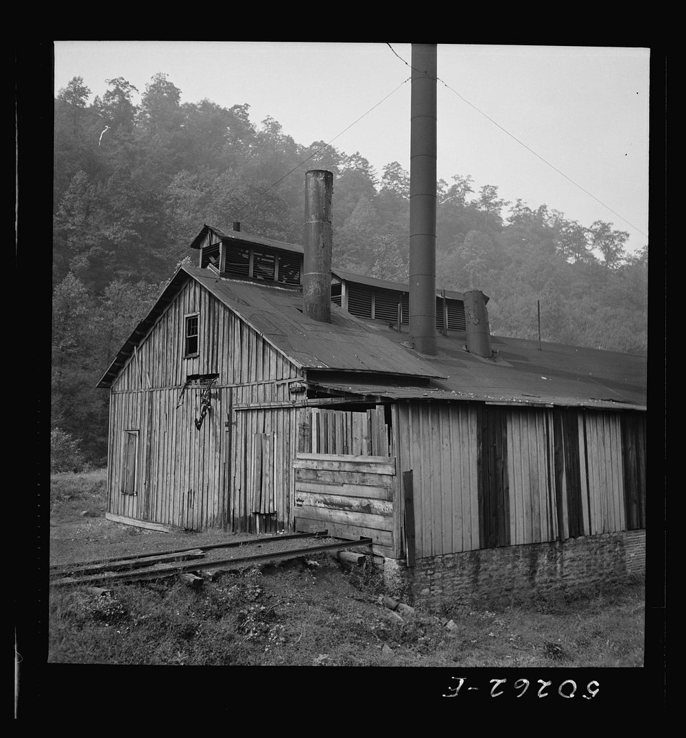 [Untitled photo, possibly related to: Boarded-up houses in abandoned mining town of Twin Branch, West Virginia]. Sourced…