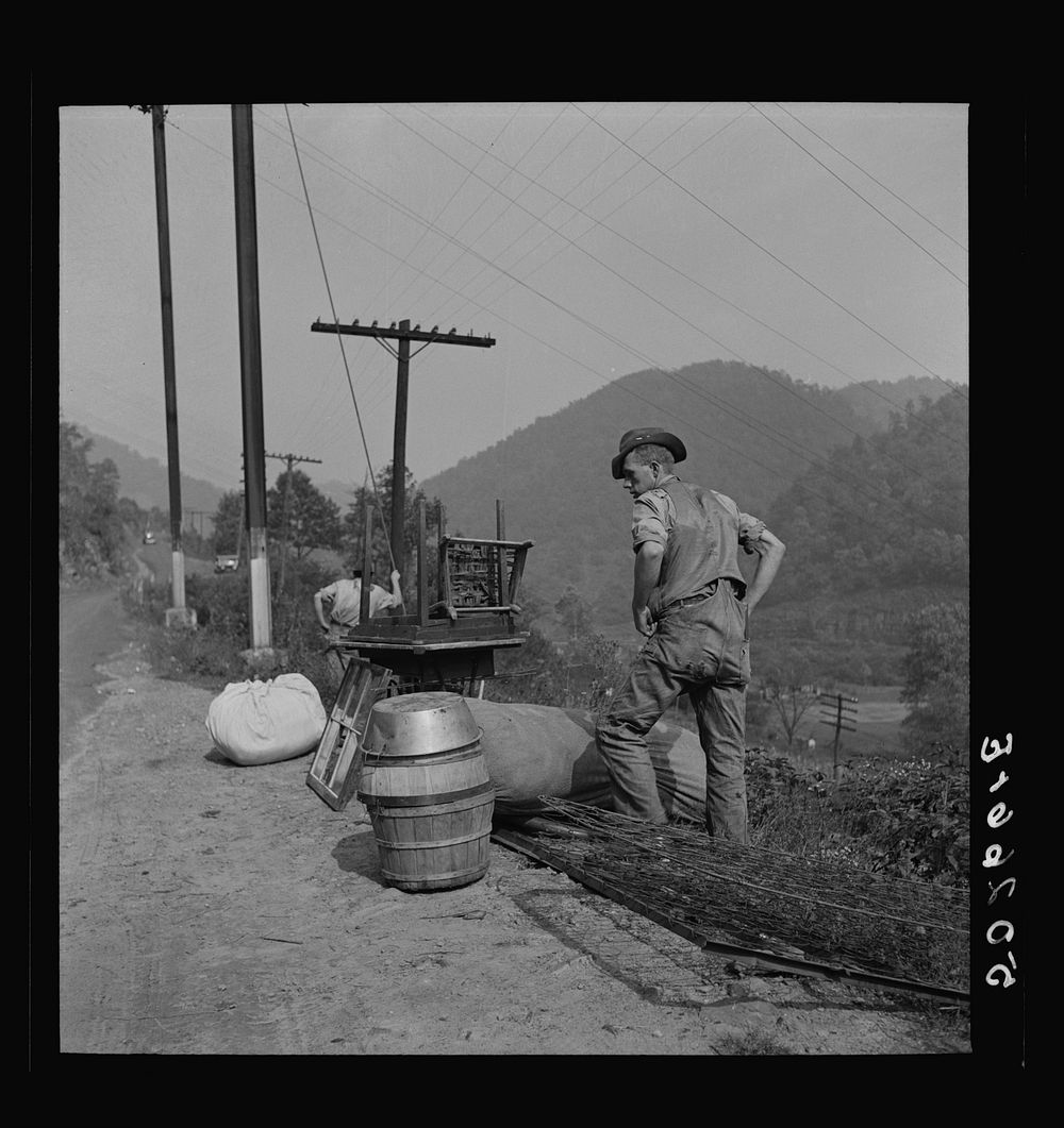 [Untitled photo, possibly related to: Places to live being very scarce, miners must sometimes wait on main country roads for…