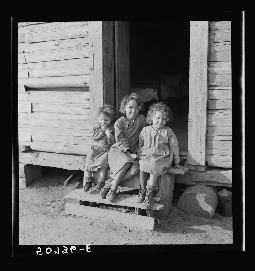 [Untitled photo, possibly related to: Family of rehabilitation client on front porch of new home near Raleigh, North…