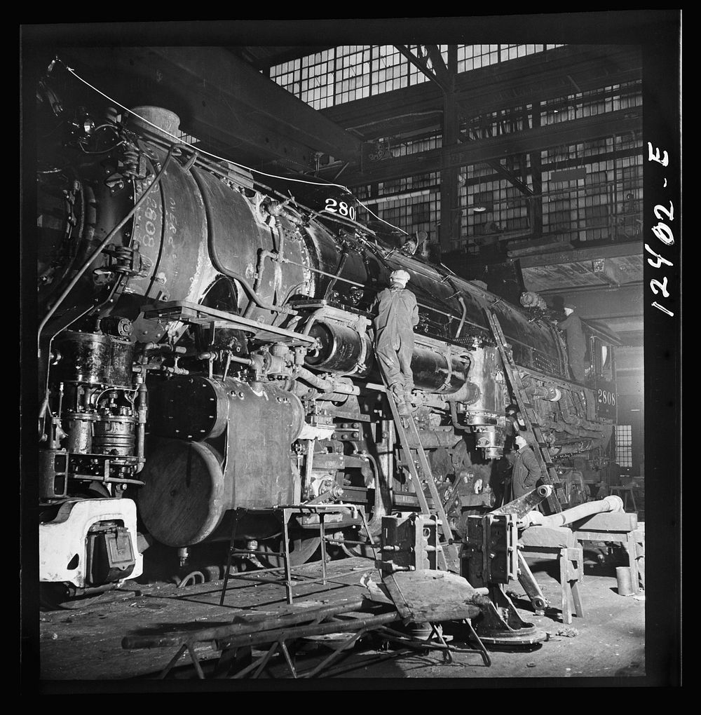 Chicago, Illinois. A locomotive of the 2000 class being repaired at the Chicago and Northwestern Railroad locomotive shops.…