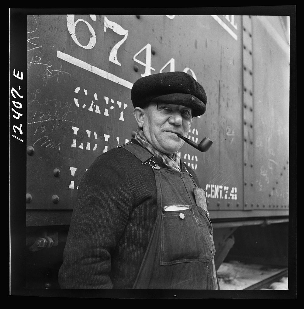 Chicago, Illinois. Railroad worker whose job is to inspect journal boxes, brake shoes, etc. and make minor repairs at a…