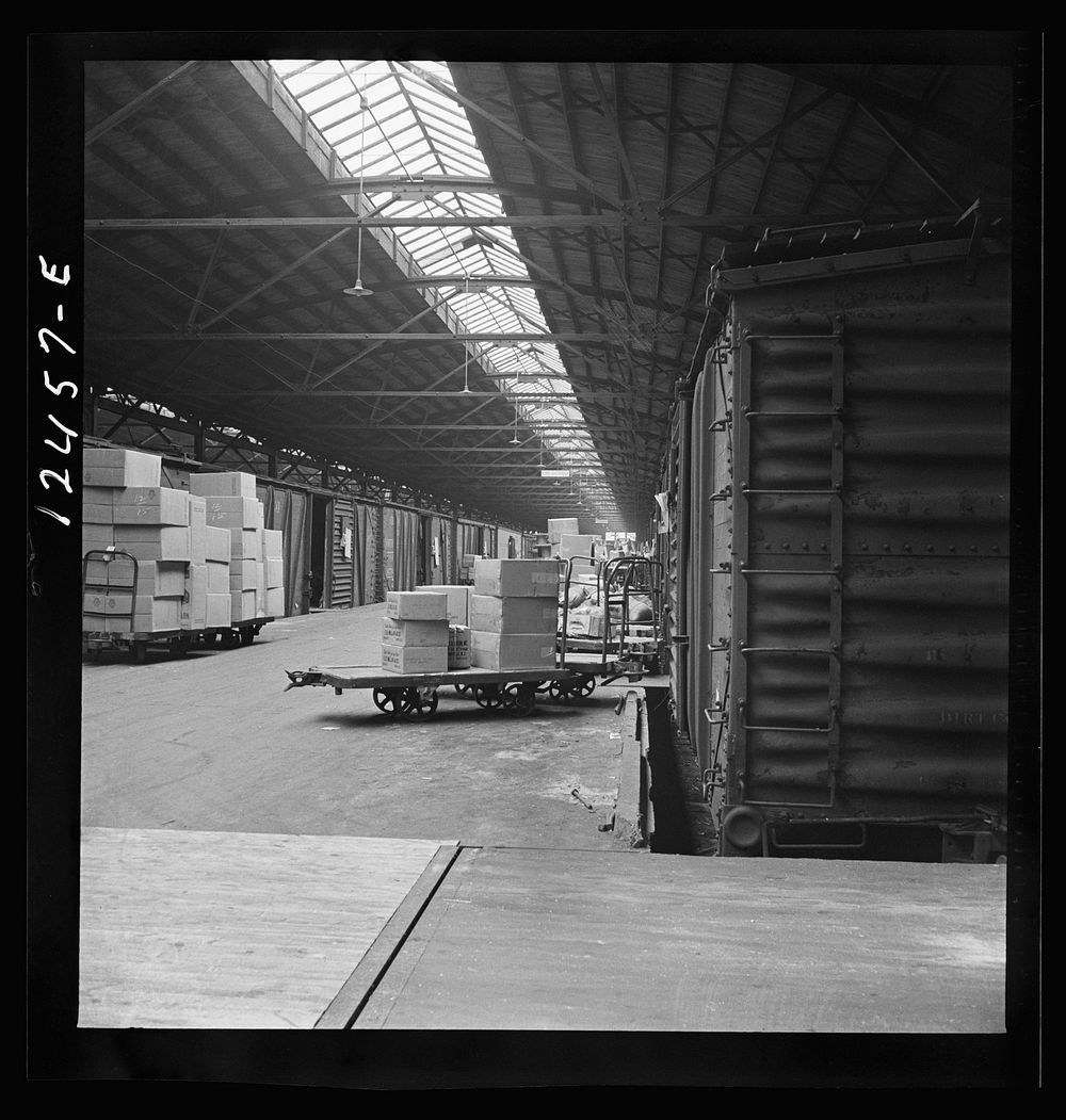 Chicago, Illinois. Goods of every description on loading platforms in a yard waiting to be loaded into cars at the Chicago…