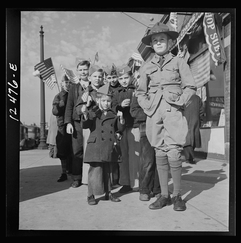 Chicago (north), Illinois. Parade starting at Office of Civilian Defense headquarters, before the dedication of a flag in…