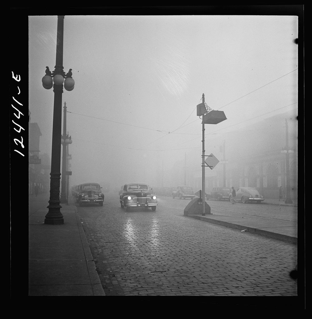[Untitled photo, possibly related to: Chicago, Illinois. An unusually heavy fog in the early afternoon]. Sourced from the…