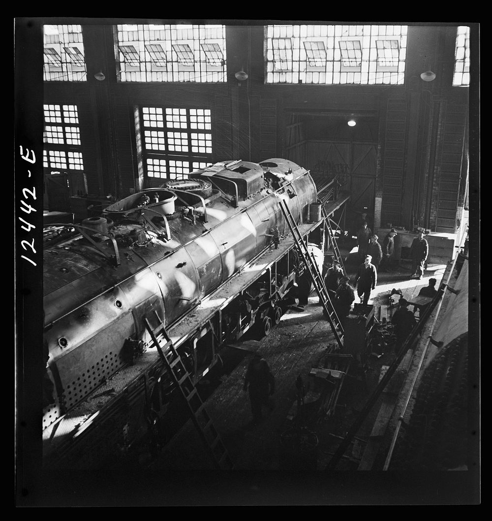 Chicago, Illinois. Working on a giant locomotive, one of the "400s," in the Chicago and Northwestern Railroad shops. Sourced…