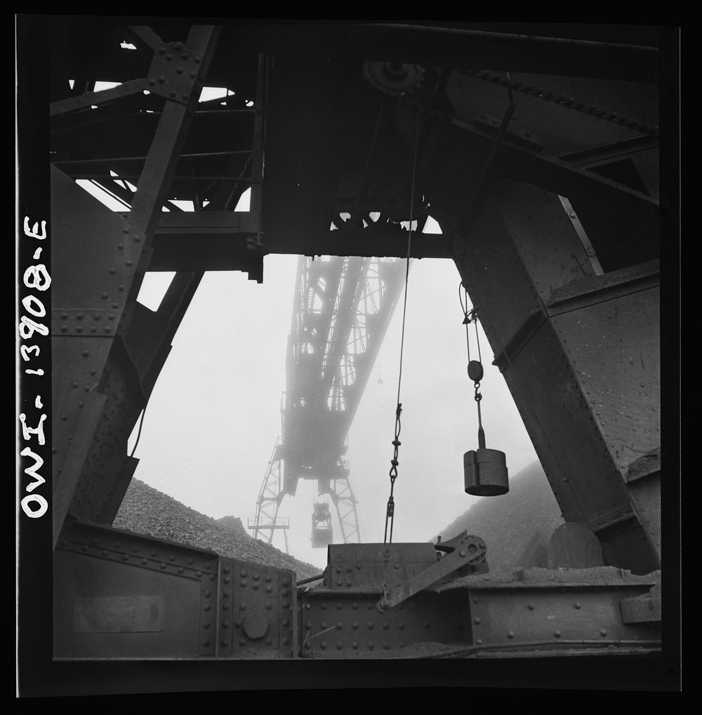 [Untitled photo, possibly related to: A worker employed at the car-loading end of a bridge at the Milwaukee Western Fuel…