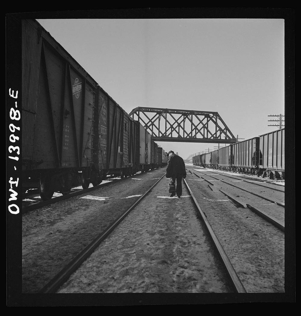 Freight train operations on the Chicago and Northwestern Railroad between Chicago and Clinton, Iowa. The train stops at…