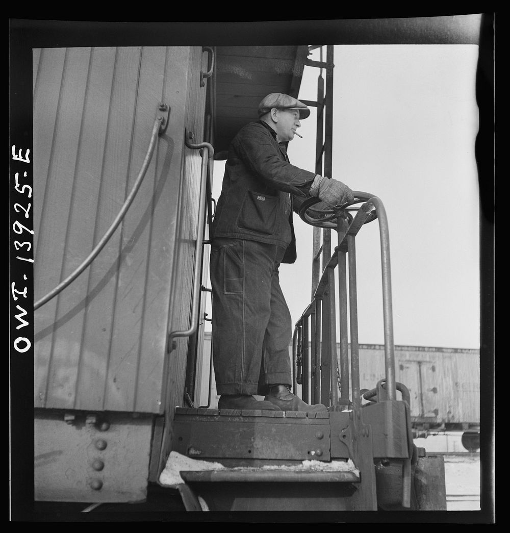 Freight operations on the Indiana Harbor Belt railroad between Chicago, Illinois and Hammond, Indiana. The conductor uses…