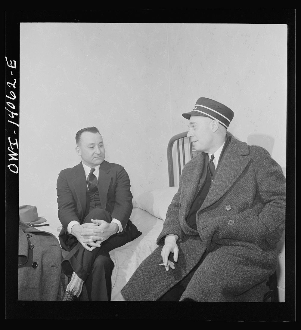 Clinton, Iowa. Lester Stein, a passenger brakeman visiting his friend Clarence Averill, a freight brakeman. Both are staying…