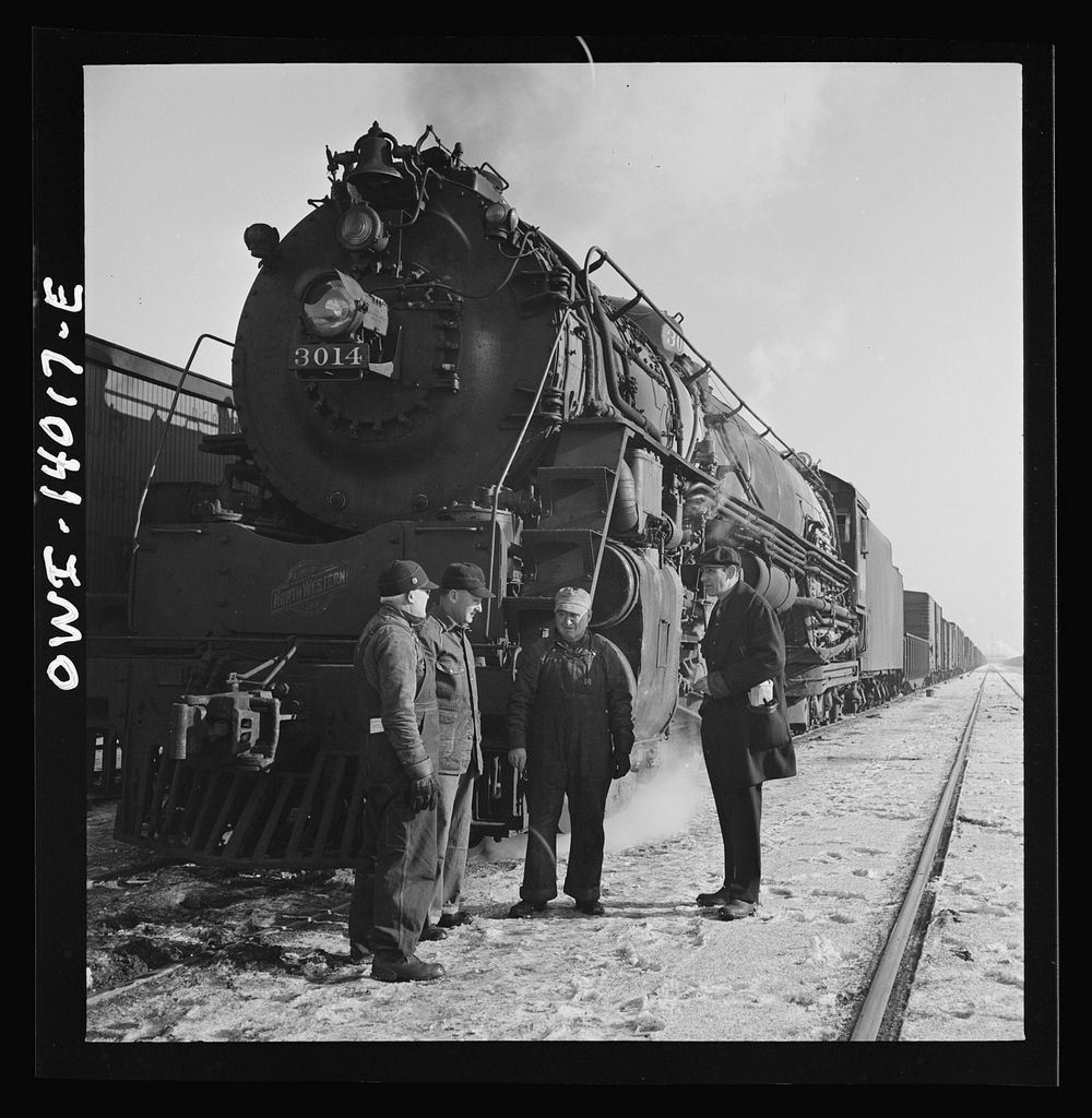 Freight train operations on the Chicago and Northwestern Railroad between Chicago and Clinton, Iowa. The crew, with…