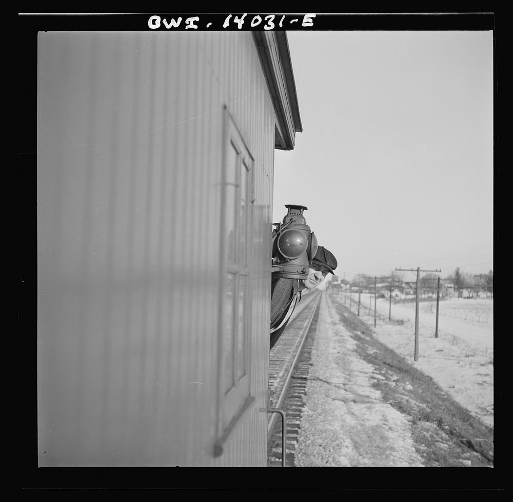 Freight train operations on the Chicago and Northwestern Railroad between Chicago and Clinton, Iowa. The last two cars of…