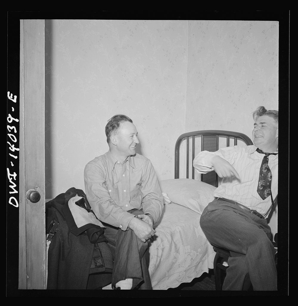 [Untitled photo, possibly related to: Clinton, Iowa. Jim Cross, brakeman, visiting Clarence Averill, another brakeman on the…